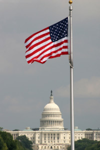 American flag flying over Capitol