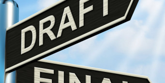 Signpost pointing to draft and final